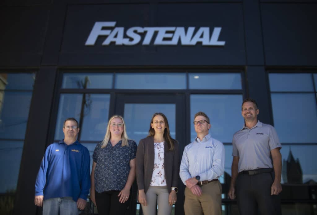 BK5K committee members standing in front of Fastenal building
